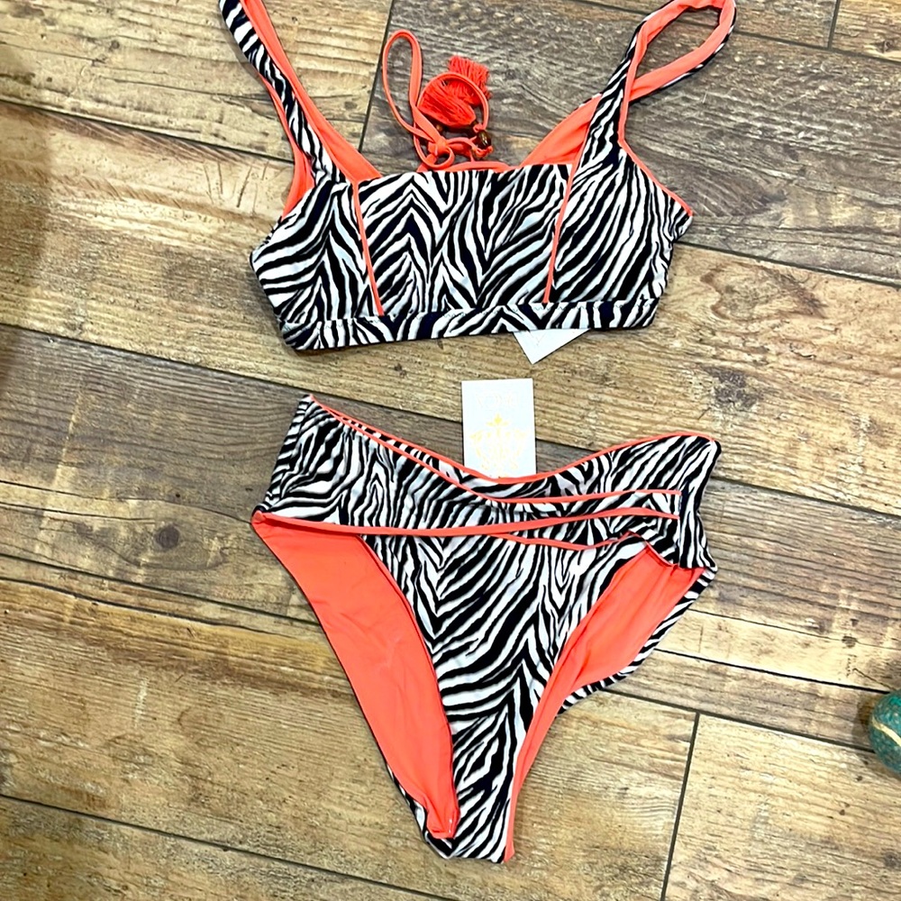 Becca new with tags zebra French cut swim suit